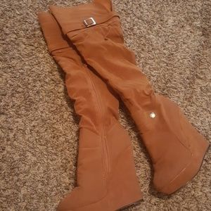 Knee high wedge boots